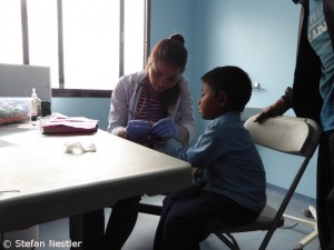 Sabina Parachuli treats a young patient