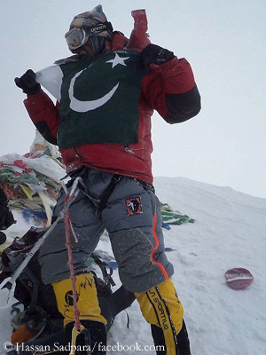 Hassan on the summit of Mount Everest in 2011