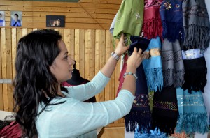 That's where Zohra comes in. She is selling colorful scarves in Germany that were stitched by Afghan women to send the revenues back to the Afghan families (Photo: Falk Steinborn)