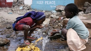 Kids drinking water in the Kibera slum