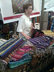 Ruth Zhumbul helps sell the rugs to customers abroad (Photo: N. Aghaji)