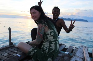 Felicity Finlayson relaxing with local staff on Pom Pom Island, Malaysia