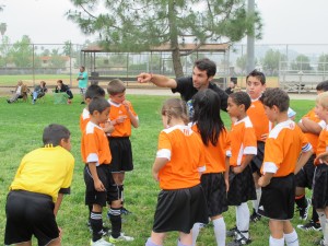 Mark with members of a YALLA soccer team