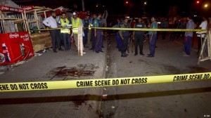 The unknown attackers hacked Roy to death using long machetes in front of pedestrians and police.