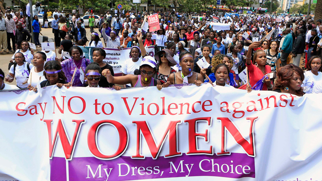 Women take part in a protest along a main street in the Kenyan capital of Nairobi November 17, 2014. The demonstrators were demanding justice for a woman who was attacked and stripped recently in Nairobi by men who claimed that she was dressed indecently. 